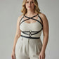 HarnessClub plus-size black leather harness-style body accessory with crossfront straps and metal hardware