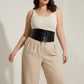 Plus Size Black Lace-Up Corset Body Harness worn over a cream ribbed tank and beige trousers