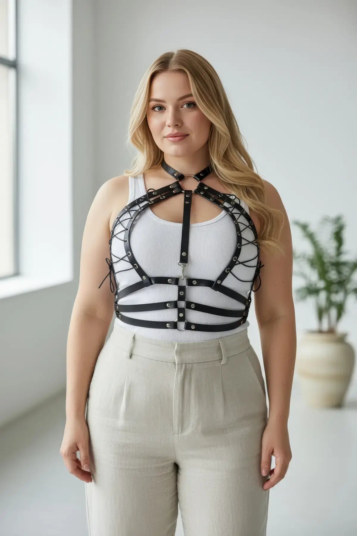 Plus Size Black Lace-Up Corset-Style Leather Harness worn over white tank top