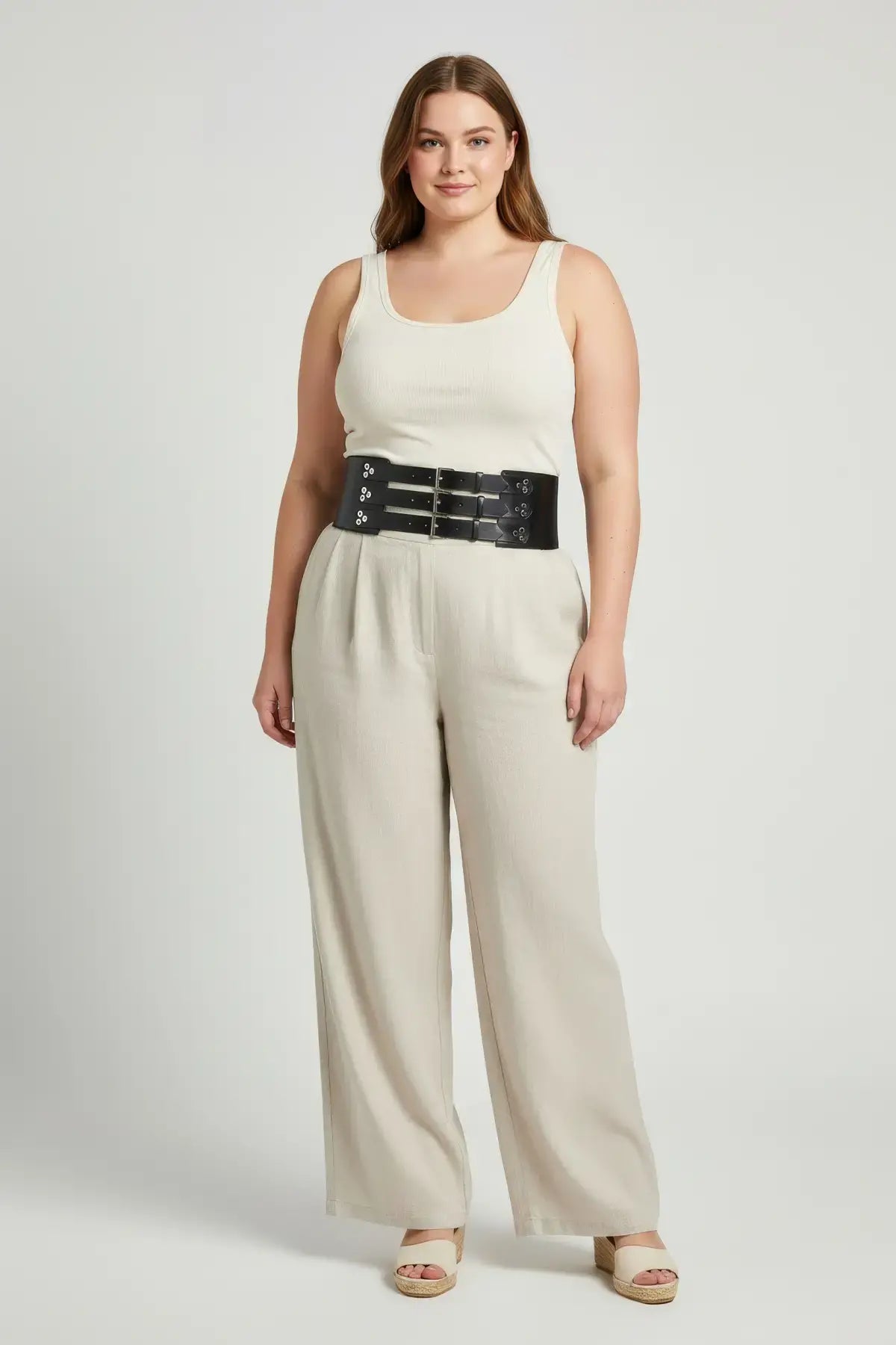 Plus Size Black Multi-Buckle Wide Corset Belt by HarnessClub, worn over a white tank top.