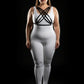 Plus size black multi-cross cage chest harness by HarnessClub over white bodysuit