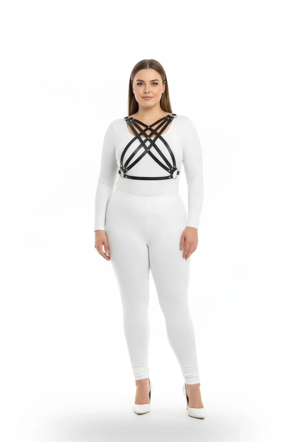 Plus-size black vegan-leather multi-cross cage chest harness worn over a white bodysuit.