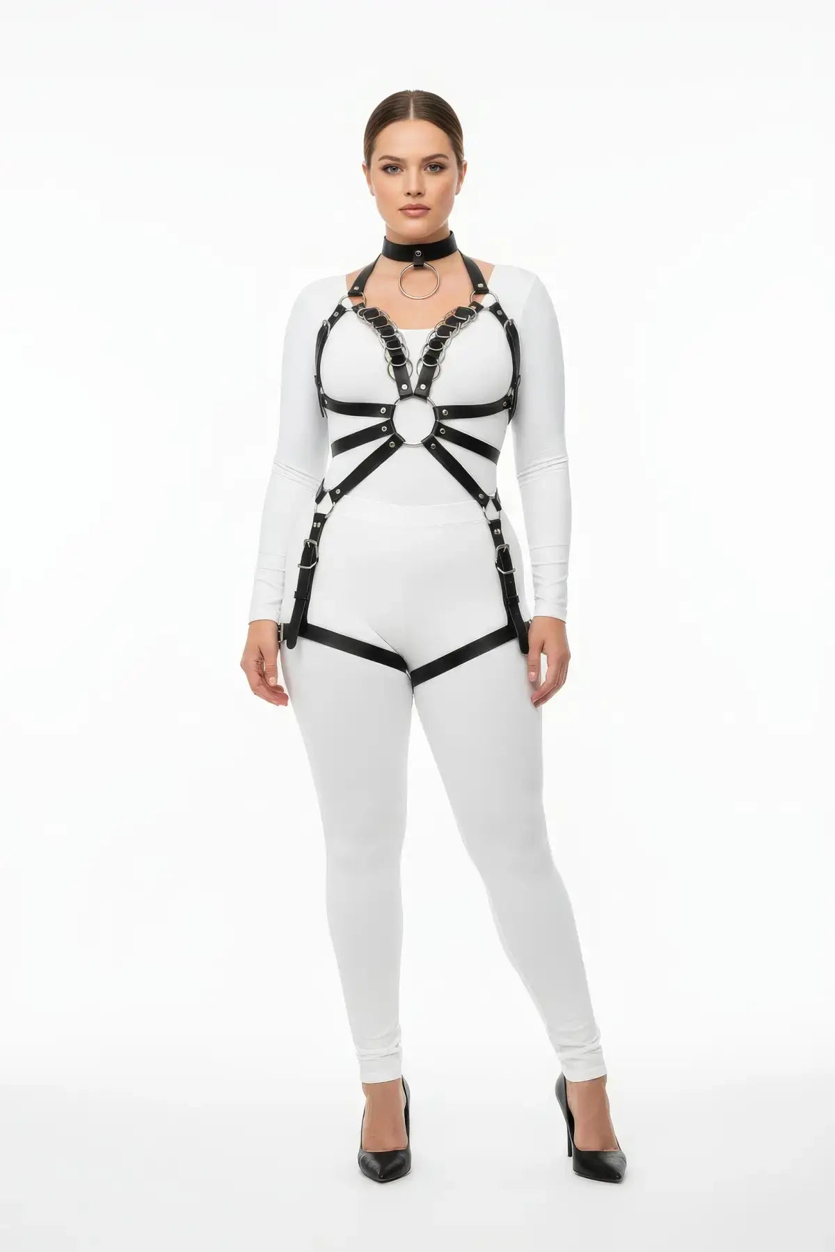 Plus-size black vegan leather body harness with O-ring centerpiece and chain-detail straps, HarnessClub