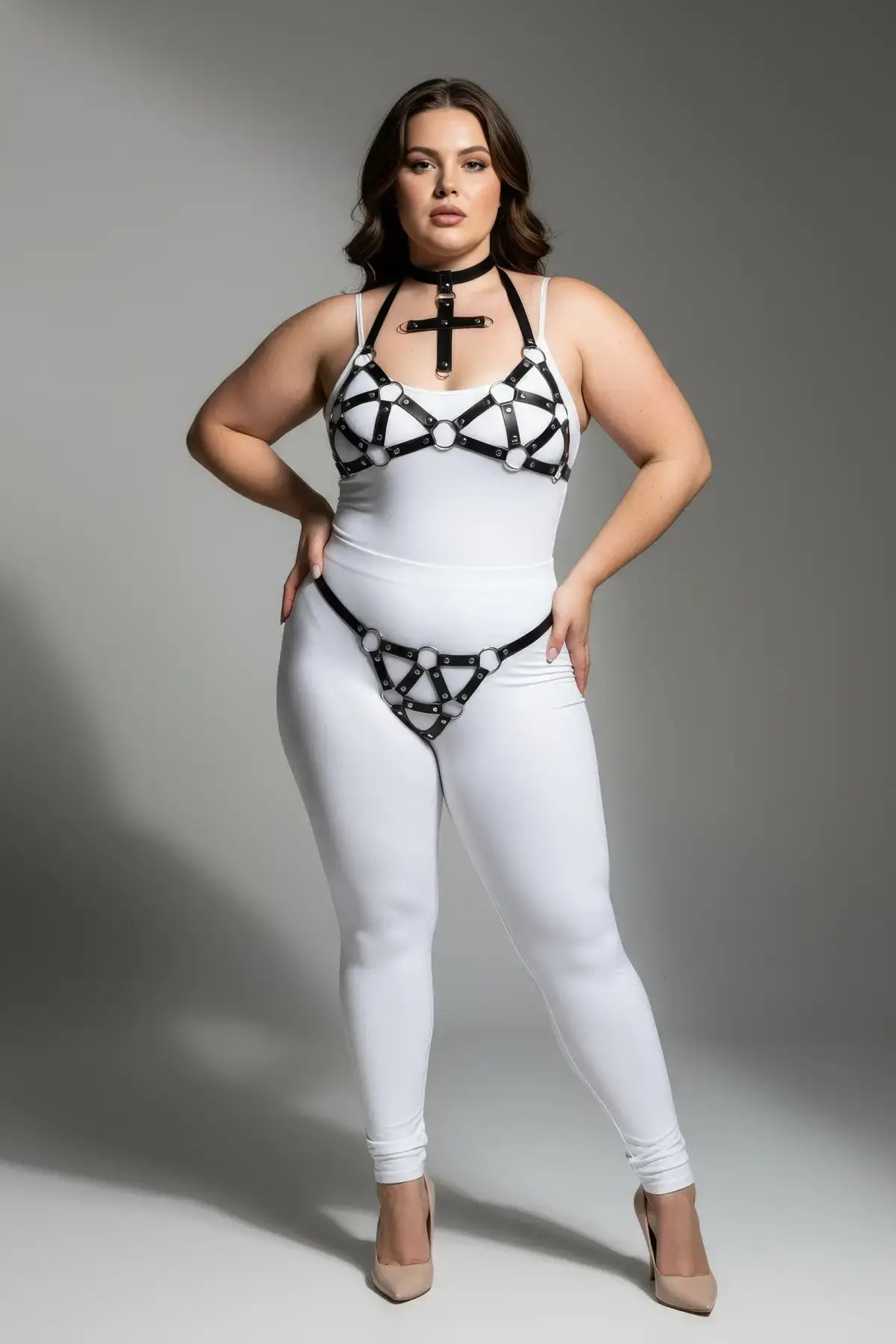 HarnessClub three-piece black faux-leather O-ring body harness set with choker over white bodysuit