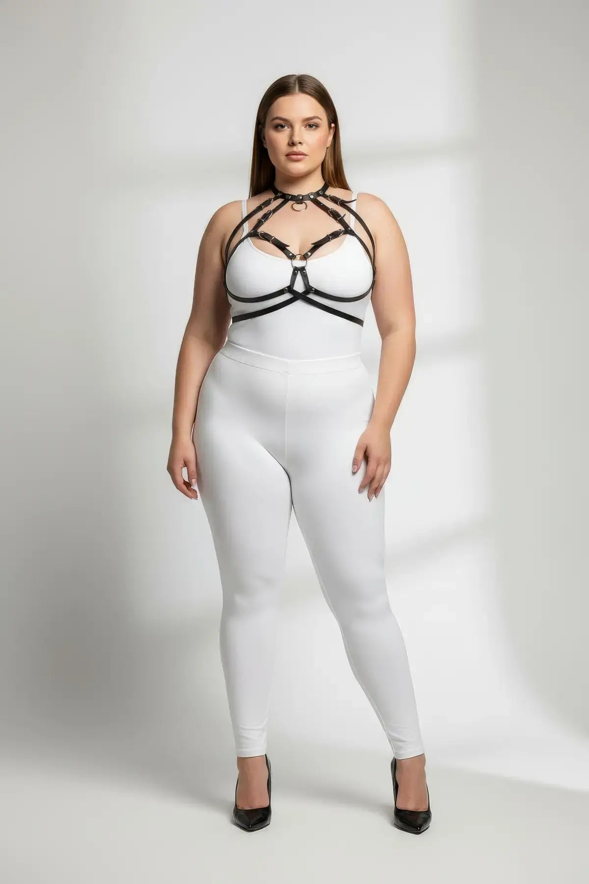 Plus-size black faux-leather over-outfit harness with O-rings by HarnessClub