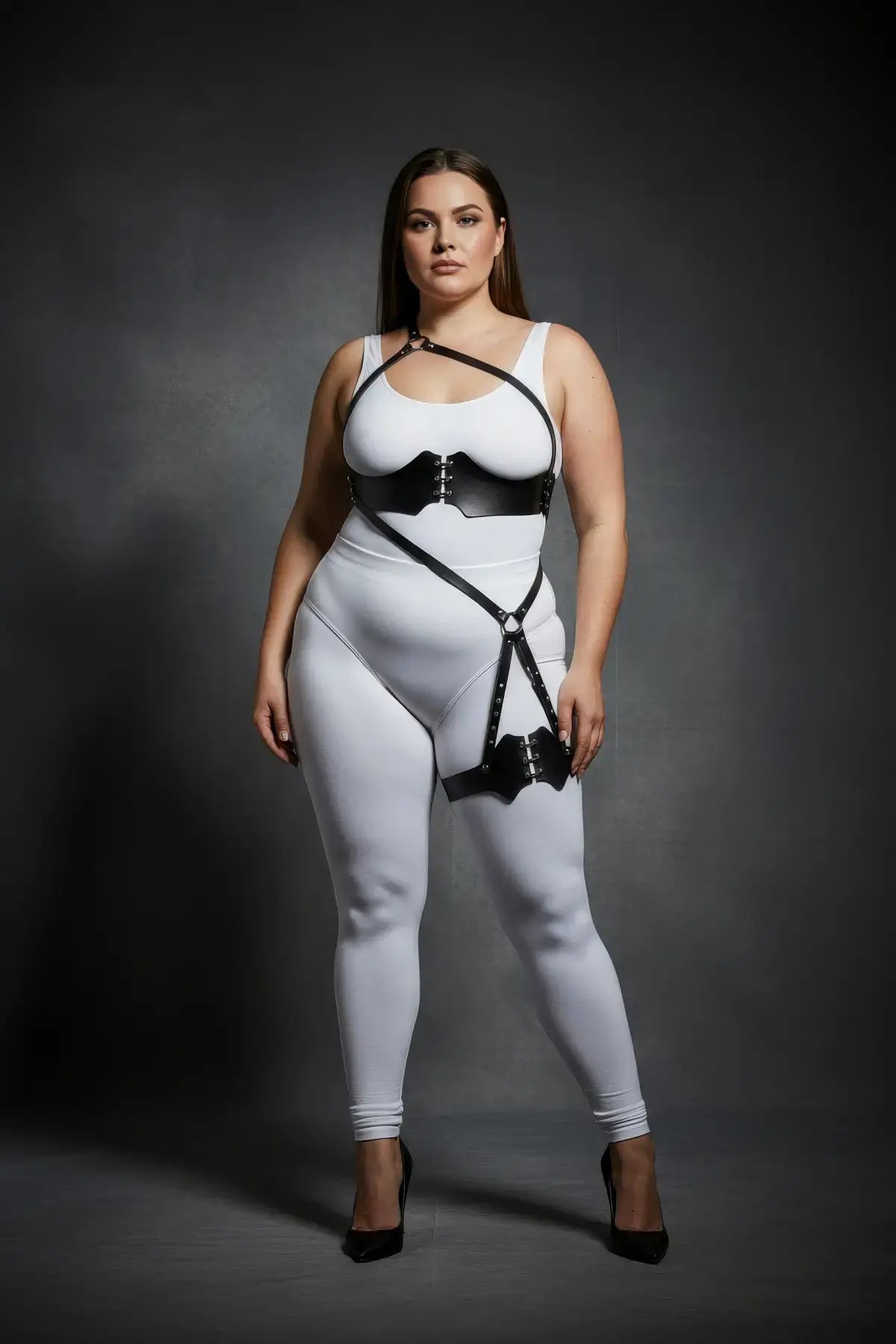 Plus-size black vegan leather one-shoulder bustier harness with scalloped thigh garter by HarnessClub