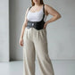 Plus-size black vegan leather shoulder-strap corset vest with double-buckle waist harness