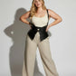 Plus-size black vegan leather shoulder strap harness vest with double buckles and peplum waist cincher