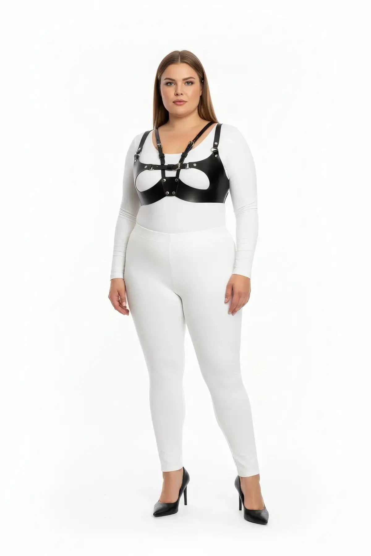Plus-size black structured vegan leather chest harness by HarnessClub, worn over a white top