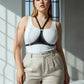Plus-size black studded leather body harness with neck strap and metal studs