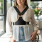 Plus Size Black Studded Leather Body Sash by HarnessClub worn over white blouse