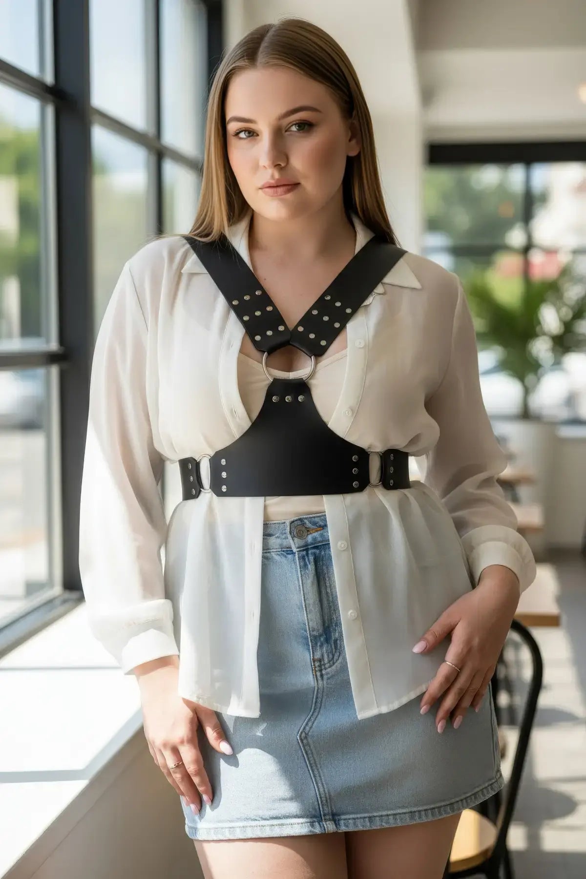 Plus Size Black Studded Leather Body Sash by HarnessClub worn over white blouse