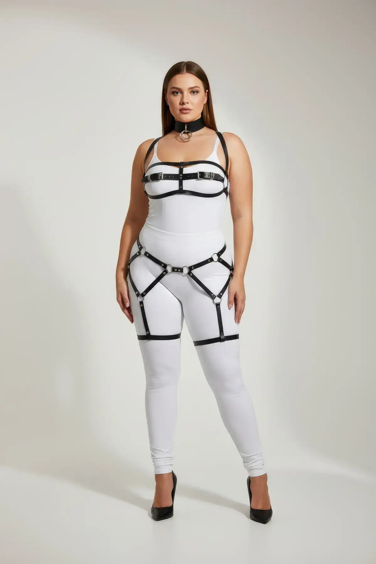 Plus Size Black Suspender Garter Harness Set in faux-leather worn over a white bodysuit with a choker