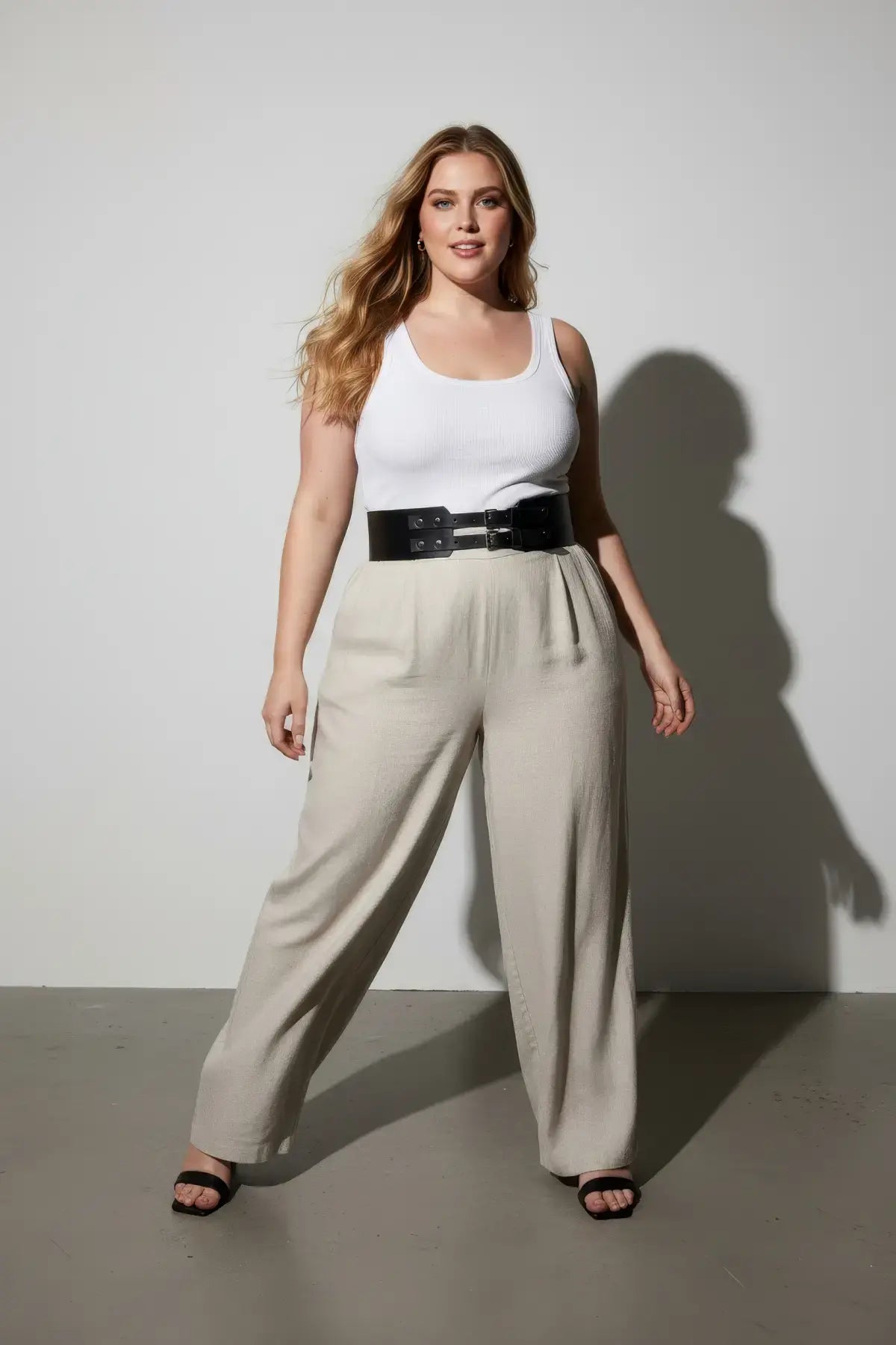 Plus Size HarnessClub Black Thick Double-Buckle Studded Belt worn at the waist.