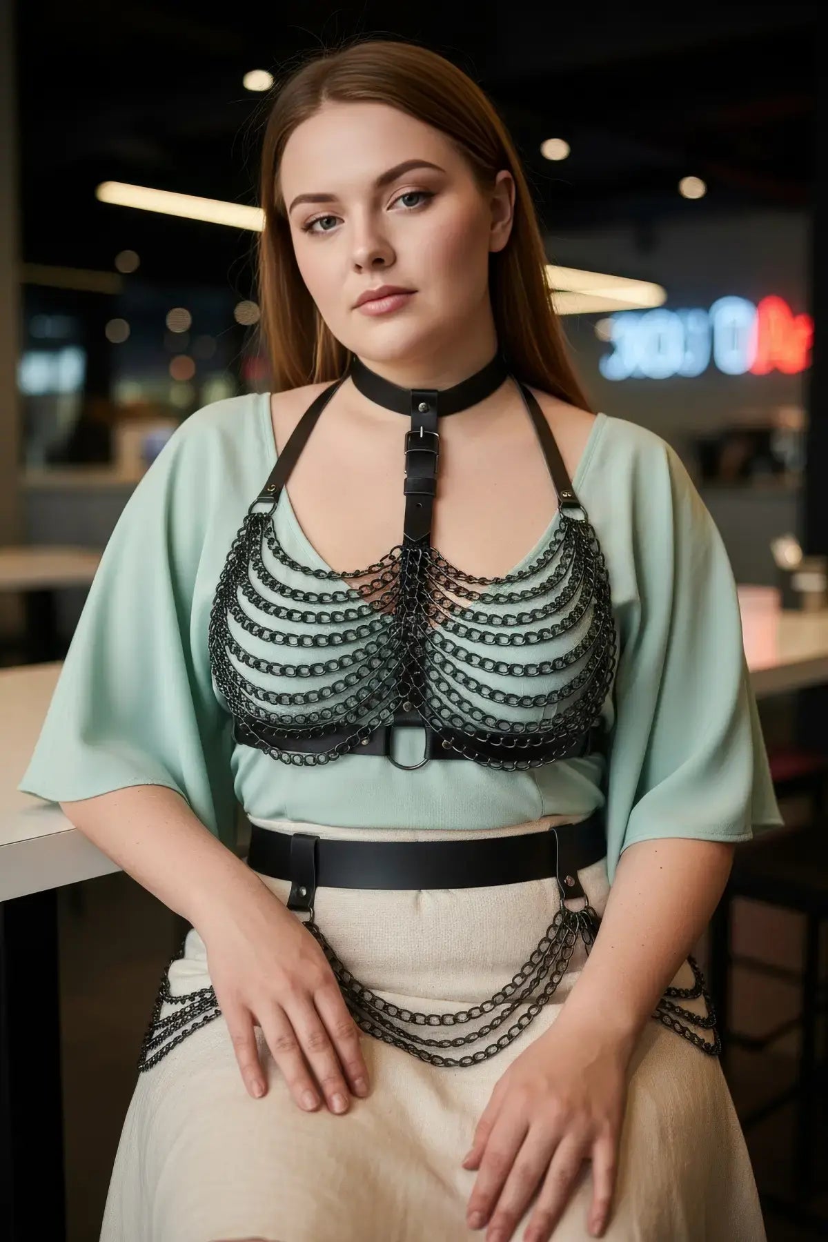 Plus-size black vegan leather two-zone chain bib harness with choker collar and shoulder straps