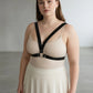 Plus-size black vegan-leather V-frame chest harness with O-ring by HarnessClub