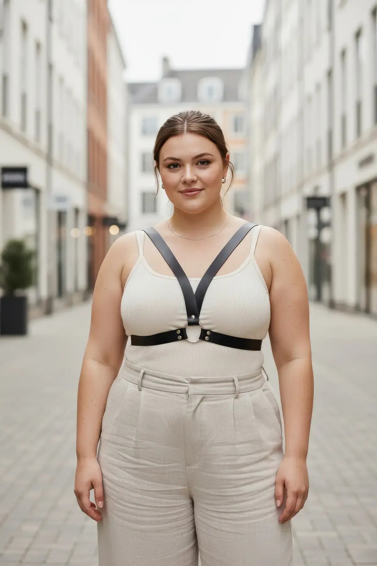 Plus-size black V-frame chest harness with O-ring, vegan leather body accessory