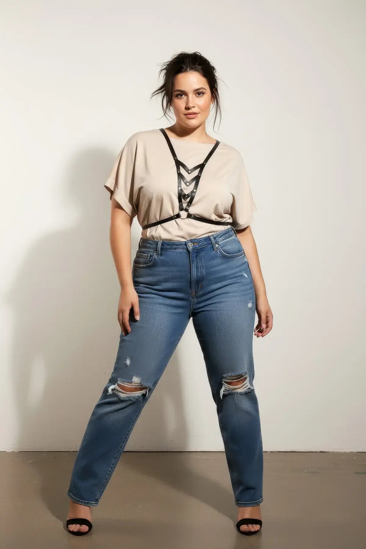 Plus Size Black V-Neck Chest Harness vegan leather worn over a beige top.