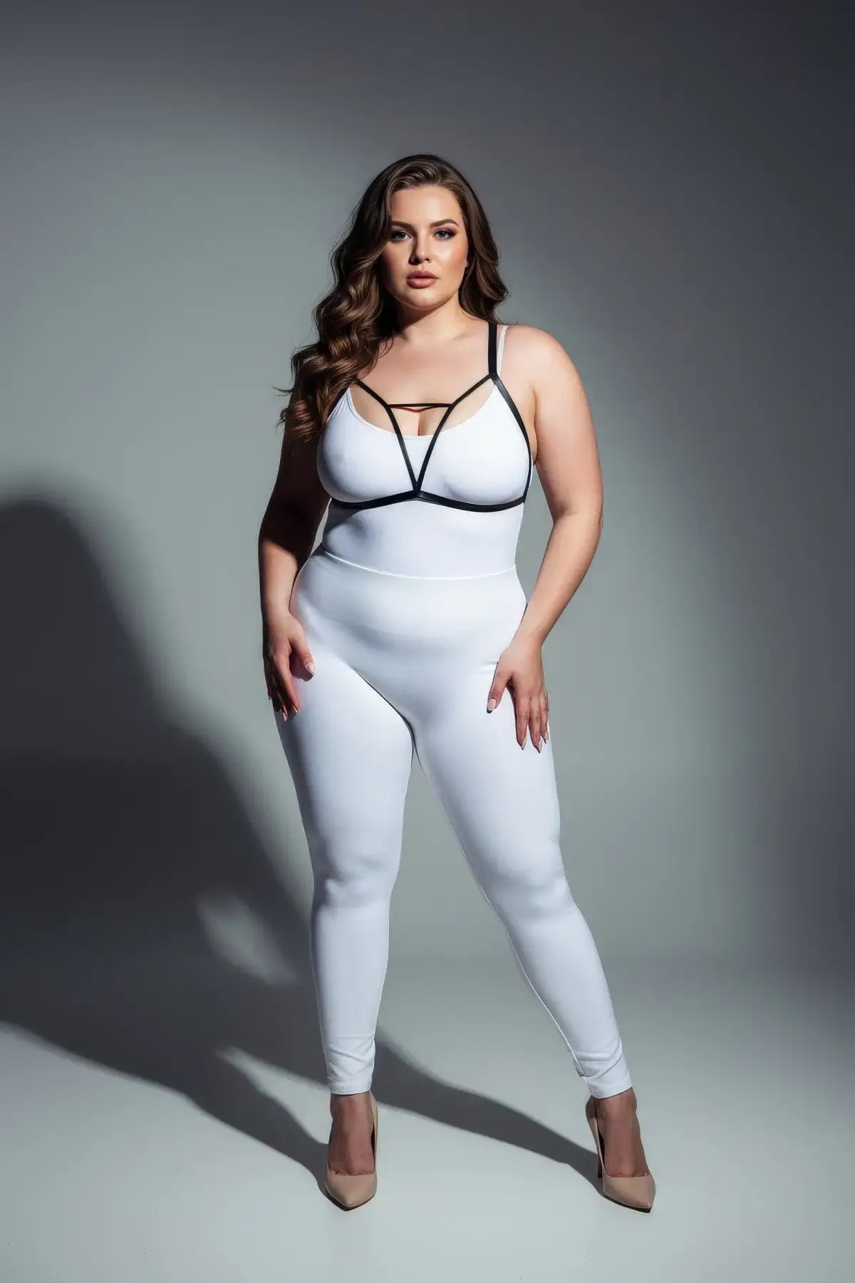 HarnessClub plus-size black V-strap elastic chest harness with keyhole detail worn by model