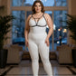 Plus-size black v-strap elastic chest harness with keyhole detail worn over a white bodysuit