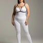 Plus-size black V-strap elastic chest harness with keyhole detail worn over a white bodysuit
