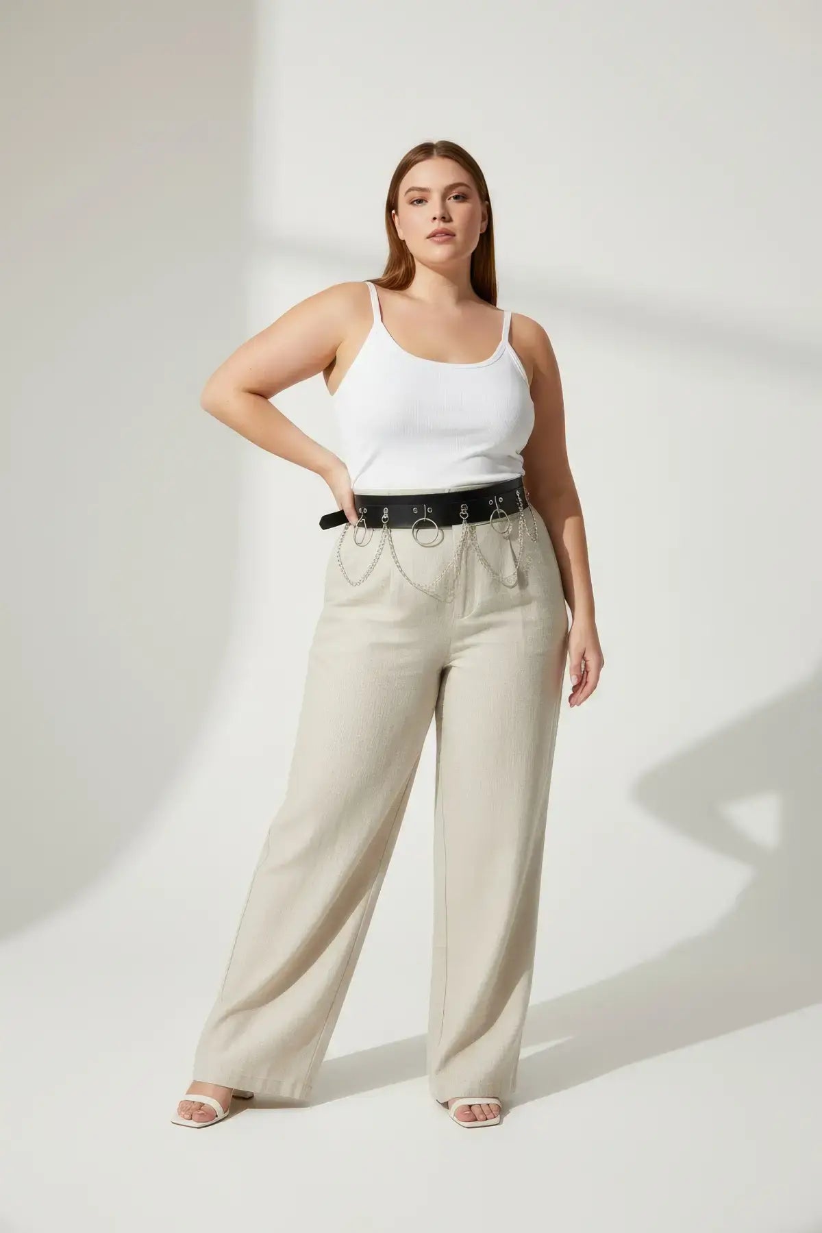 Plus-size black vegan leather waist belt with twin O-rings and chain detail
