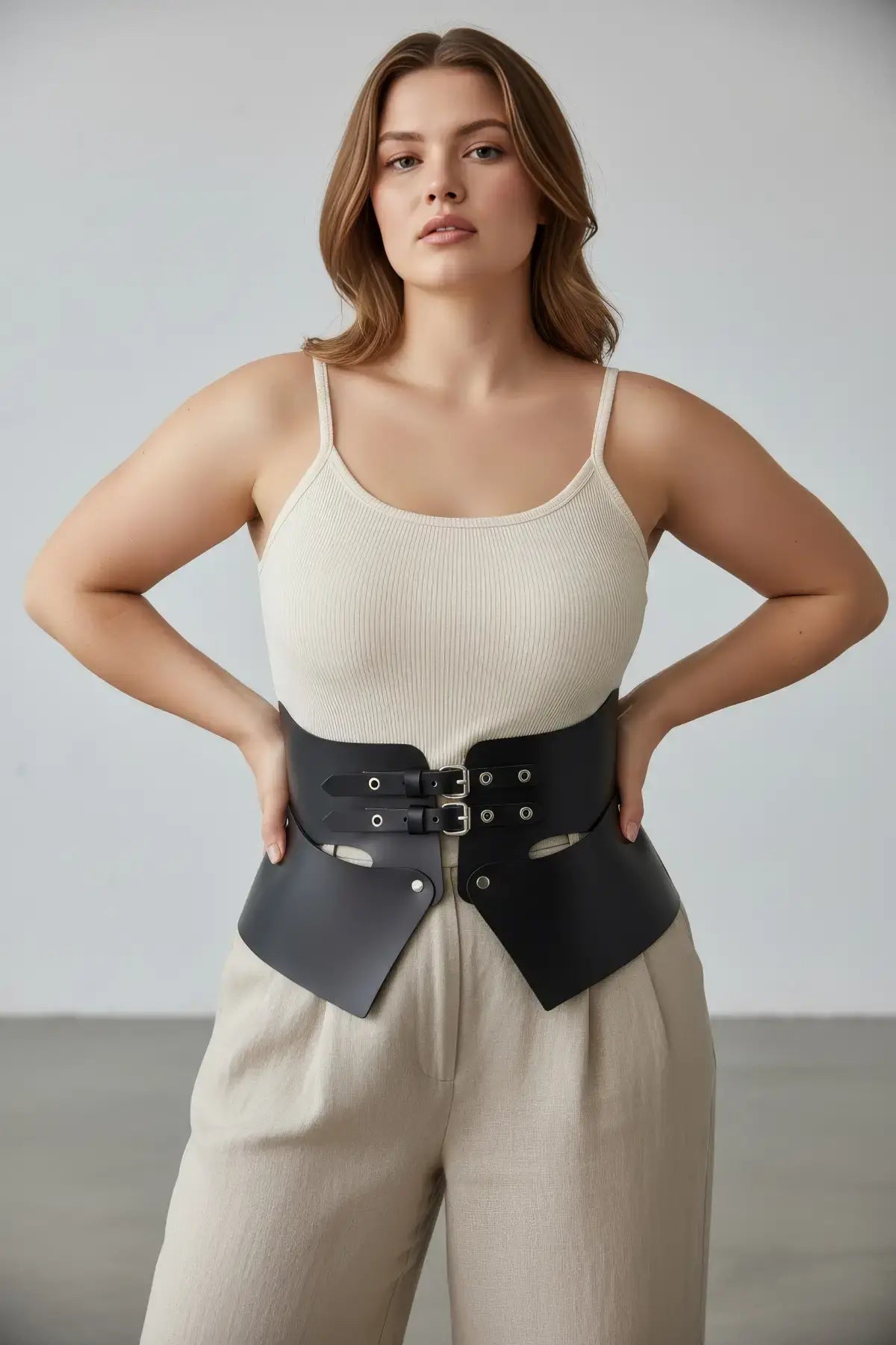HarnessClub plus-size black vegan-leather wide corset belt with peplum waist cincher