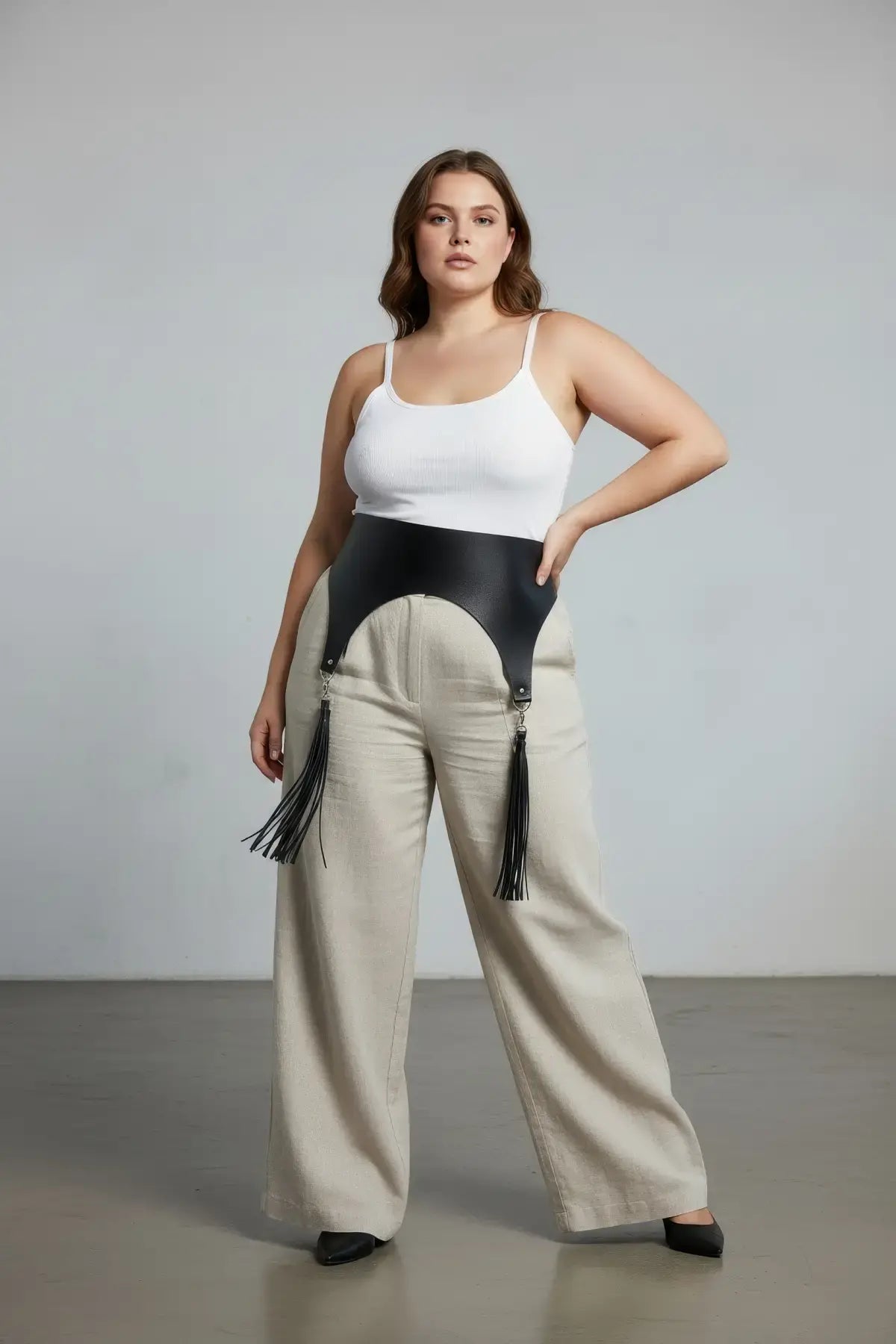 Plus-size black wide corset waist belt with deep tassels in vegan leather