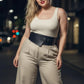 Plus Size Black Wide-Cut Corsage Body Harness by HarnessClub worn over a beige tank top