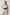 Plus-size black wide-cut corsage body harness belt over a white tank top