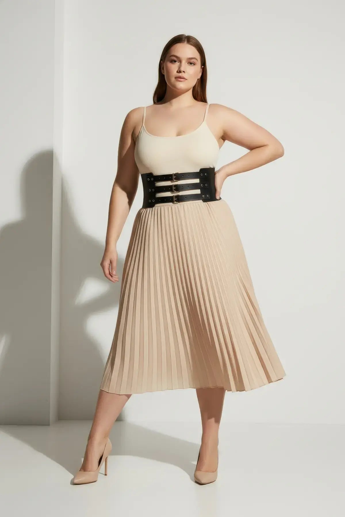 Plus Size Black Wide Triple-Buckle Corset Belt by HarnessClub; vegan leather waist accessory worn over a beige outfit