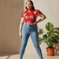 Plus Size Bold Leather Strap Body Harness, red, strappy design worn with jeans