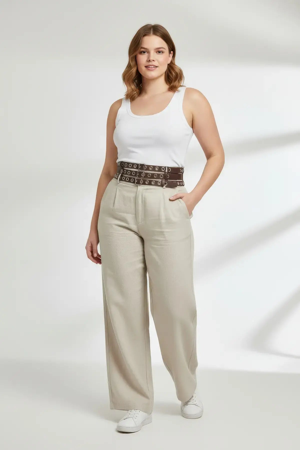 Plus-size brown triple-row grommet wide belt with multi-buckle by HarnessClub, vegan leather waist accessory.