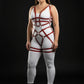 Plus-size burgundy vegan-leather grid-band full-body harness set worn over white bodysuit; silver hardware