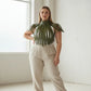 Plus Size Corset-Look Leather Body Harness by HarnessClub in olive green with riveted straps