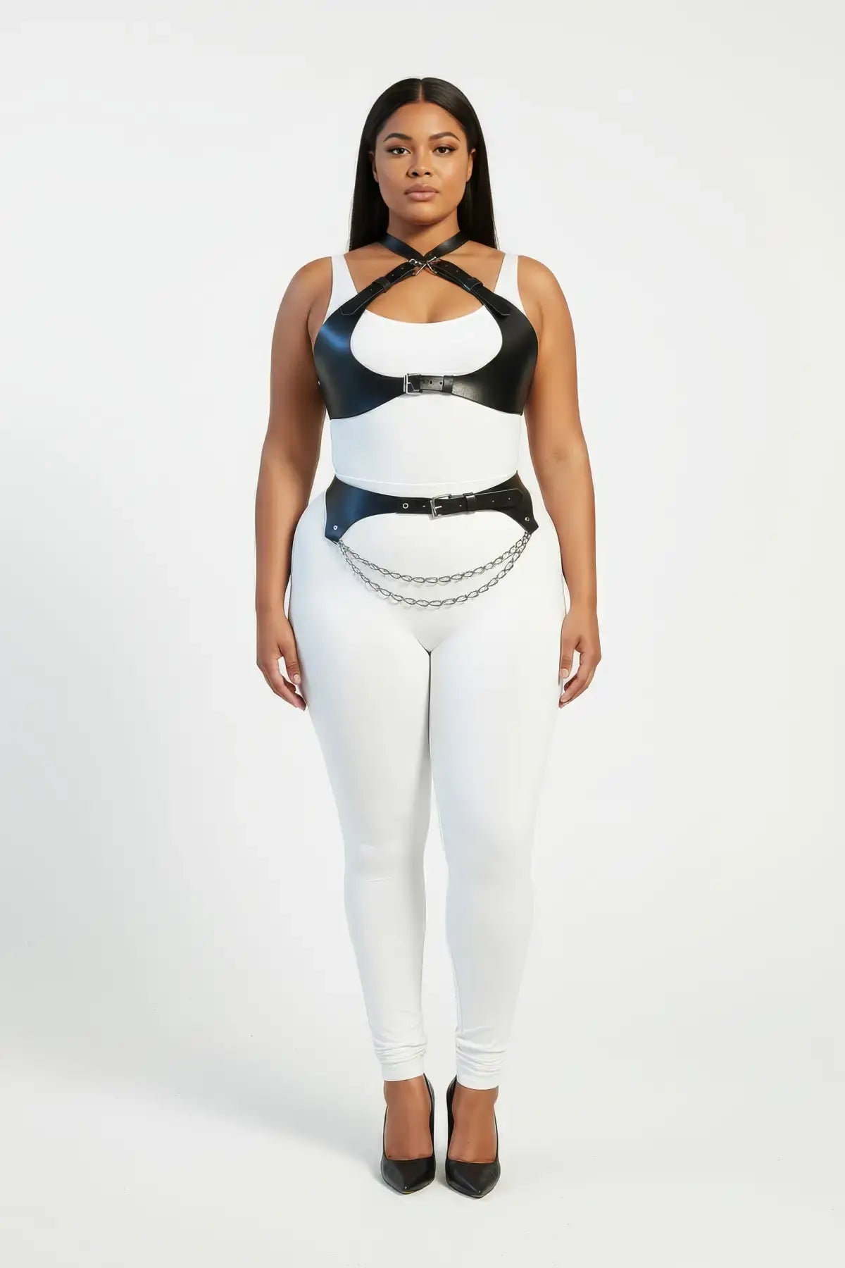 Plus-size crossover underbust crop two-piece harness in black vegan leather with a silver chain-drape waist belt by HarnessClub