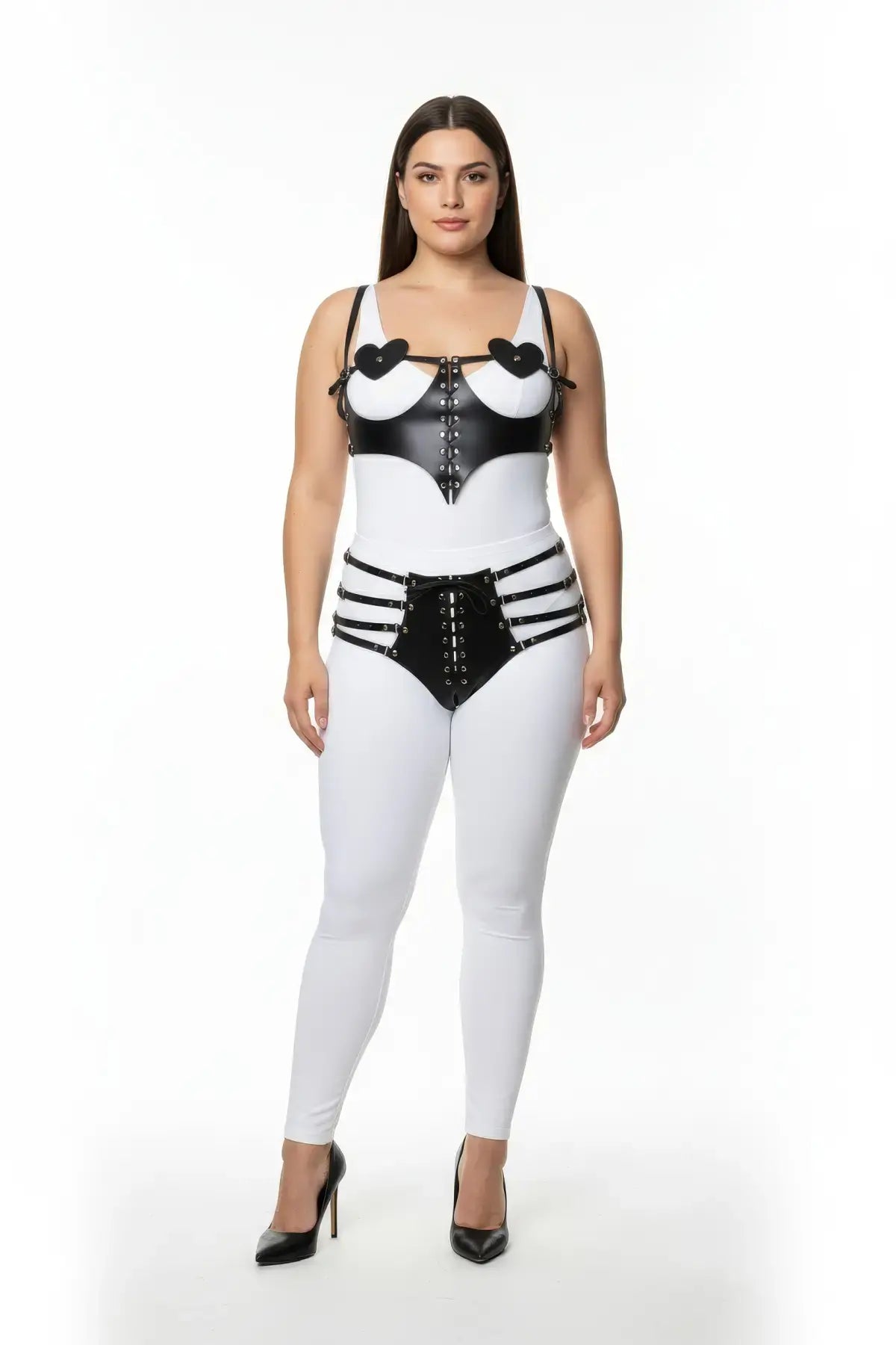 Plus-size heart-detail lace-up vegan leather harness set with high-rise shorts by HarnessClub, black-white two-piece.