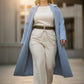 Plus Size Khaki Chain-Detail Leather Belt by HarnessClub with silver chain drape on white pants