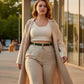 HarnessClub Plus Size khaki chain-detail leather belt worn with beige trousers