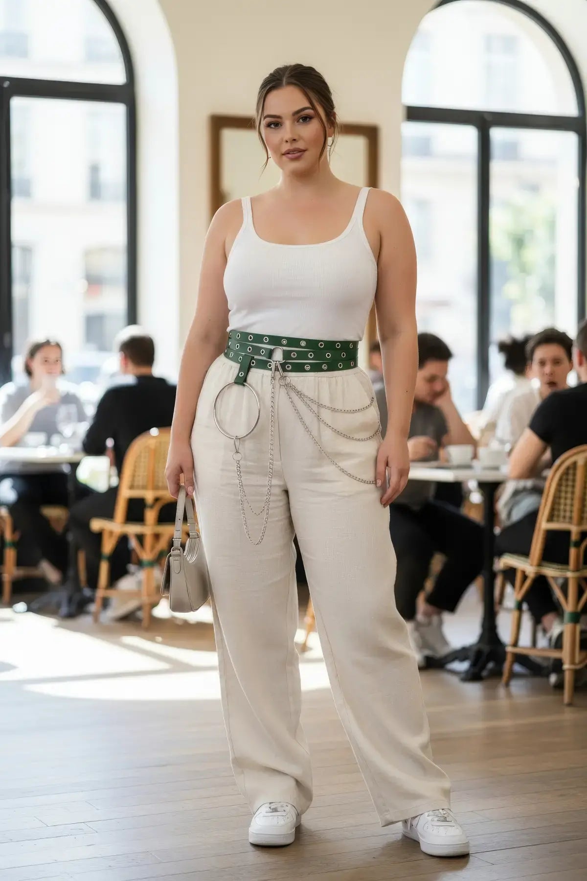 Plus-size khaki vegan-leather belt with grommets, O-ring and chain detail.