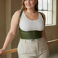 Plus Size Khaki Lace-Up Corset Belt by HarnessClub, shown over a white ribbed tank.