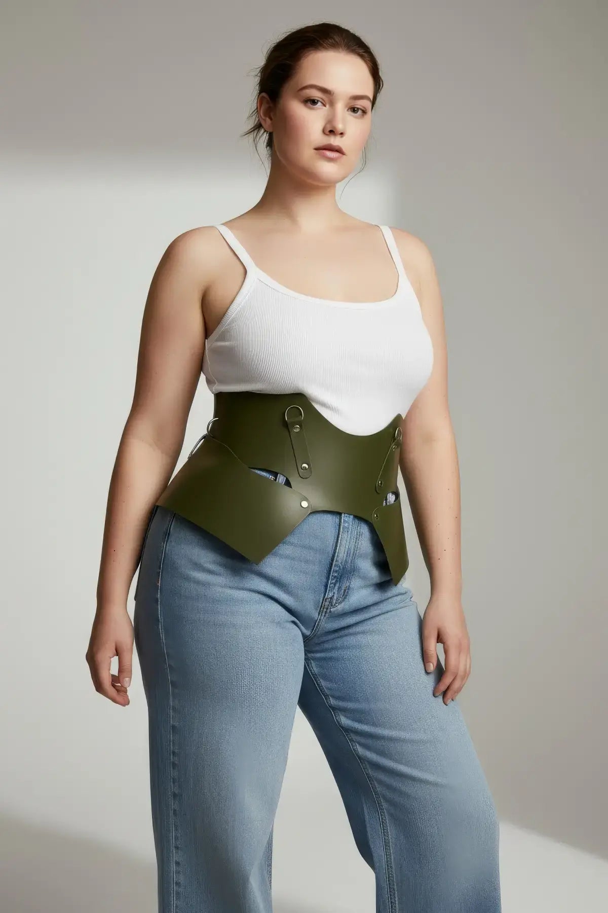 Plus Size Khaki vegan leather corset belt waist harness by HarnessClub worn by model
