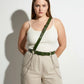 HarnessClub plus-size khaki leather body belt with chain detail worn diagonally across torso