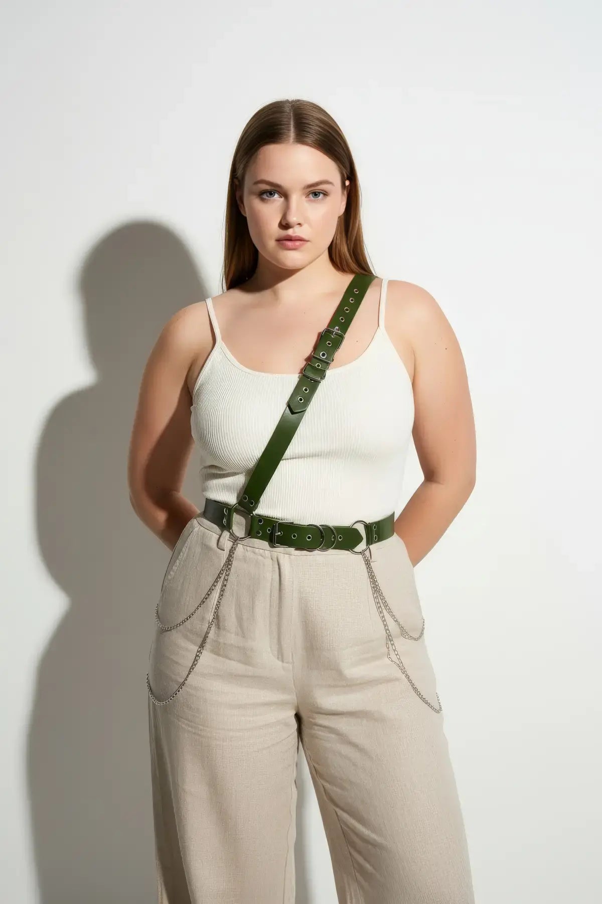 HarnessClub plus-size khaki leather body belt with chain detail worn diagonally across torso