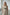 Plus-size khaki leather body harness over beige tank top with waist belt, HarnessClub