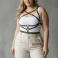 HarnessClub plus-size khaki leather body harness worn over a white tank top