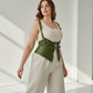 Plus-size khaki vegan-leather shoulder-harness vest with peplum waist cincher by HarnessClub