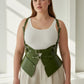 Plus-size khaki HarnessClub vegan leather shoulder strap harness vest with peplum waist cinchers.