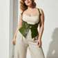 Plus-size khaki vegan leather harness vest with shoulder straps and peplum waist cincher