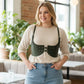 Plus-size khaki vegan-leather corset waist harness with shoulder straps on model
